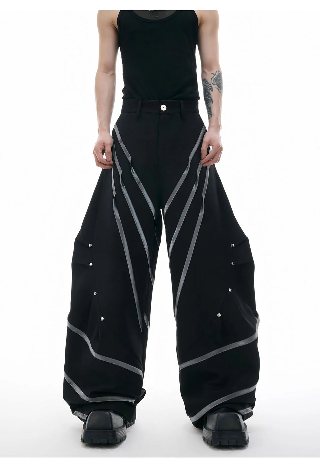 Men's polyester trousers with metal striped rivets and pleated design using three-dimensional cutting techniques
