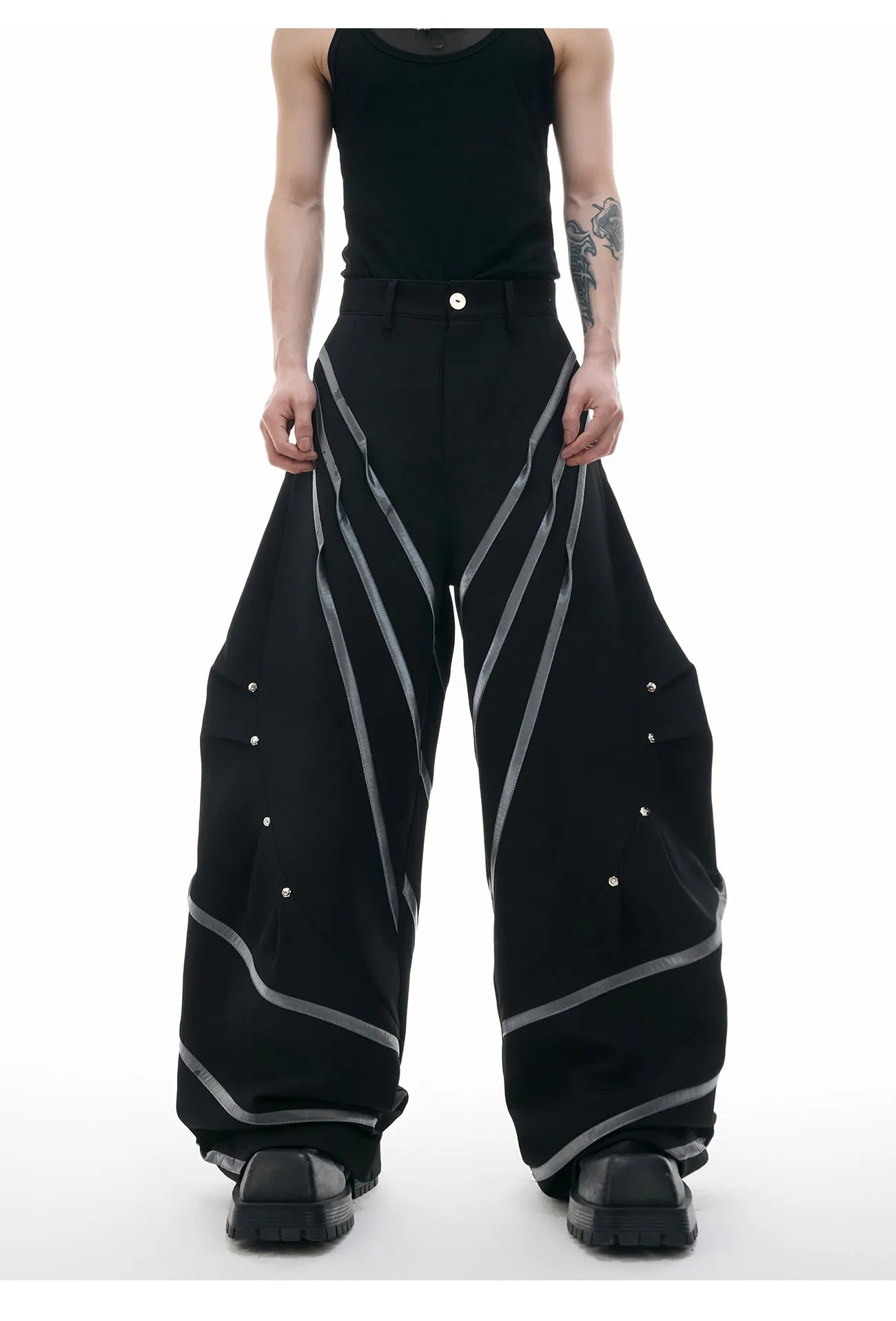 Men's polyester trousers with metal striped rivets and pleated design using three-dimensional cutting techniques