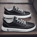 Men's white casual PU shoes with round toe and low heel on beige background