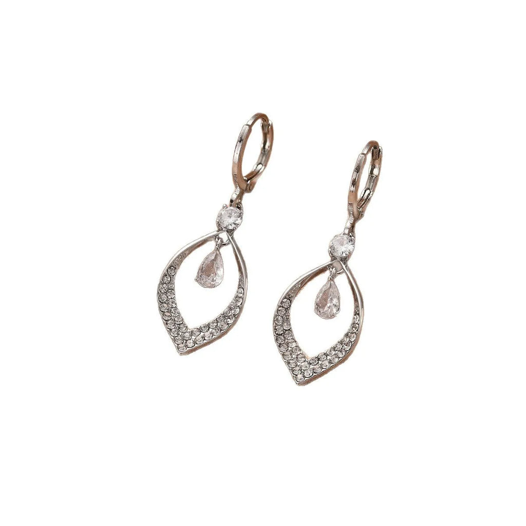 Women's gold or silver coloured zircon water drop earrings with a dangling tassel.