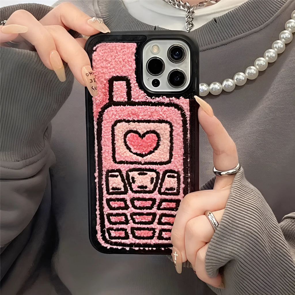 Pink towel embroidered soft TPU back cover case for Apple iPhone mobile phones.