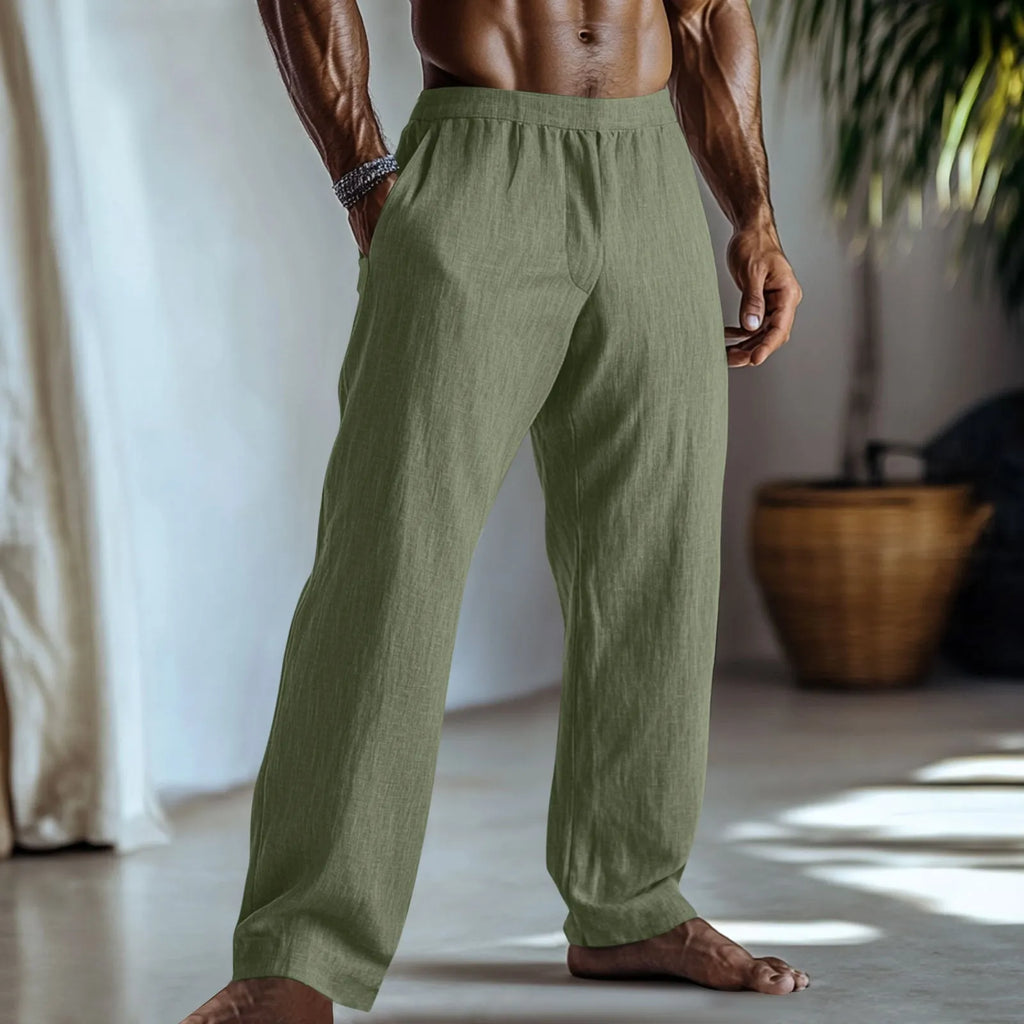 Straight-leg casual trousers in cotton and linen fabric, shown in light green colour with visible pockets.