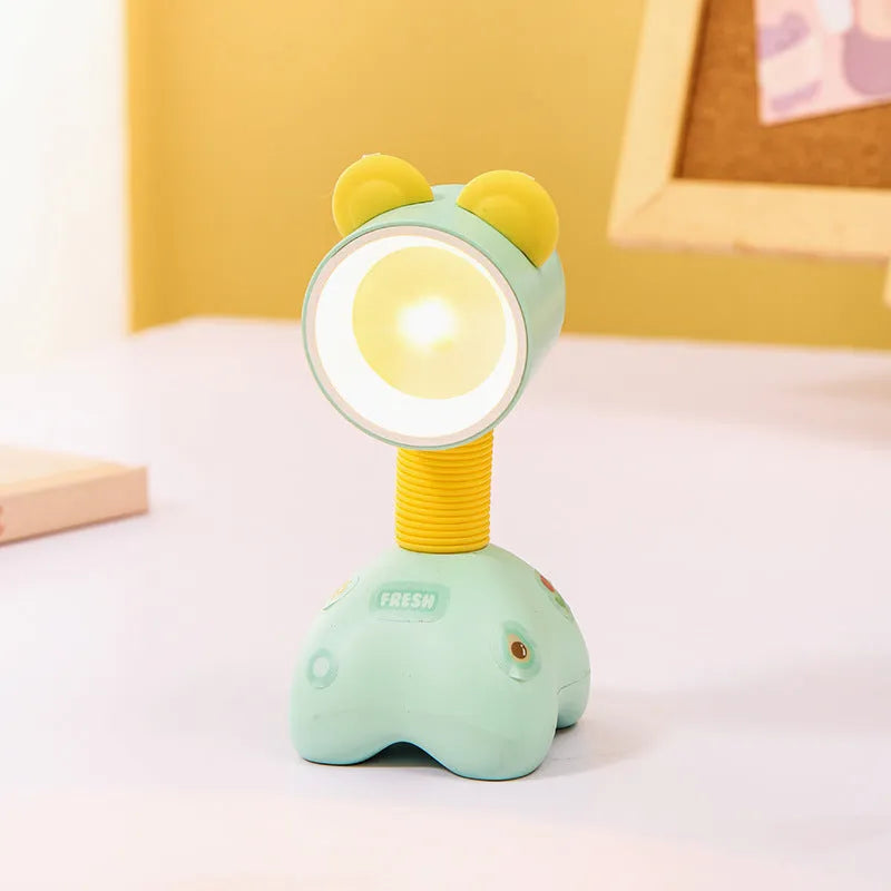 DIY cartoon magnetic small night lamp in assorted animal styles and colours on a desktop.