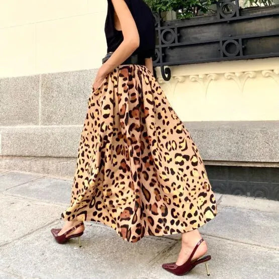 Brown leopard print women's A-line long skirt with big hem design on mannequin