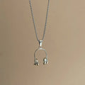 Alloy headset necklace electroplated finish unisex casual pendant jewellery on white background