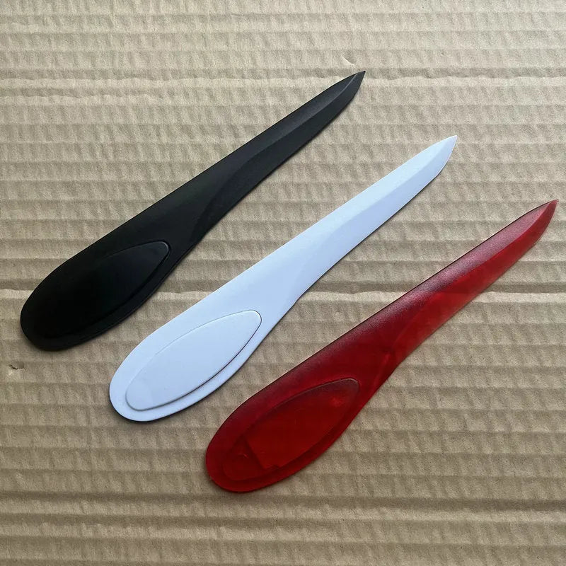 Plastic A4 paper cutter with Willow Leaf Art blade, available in black red white colours