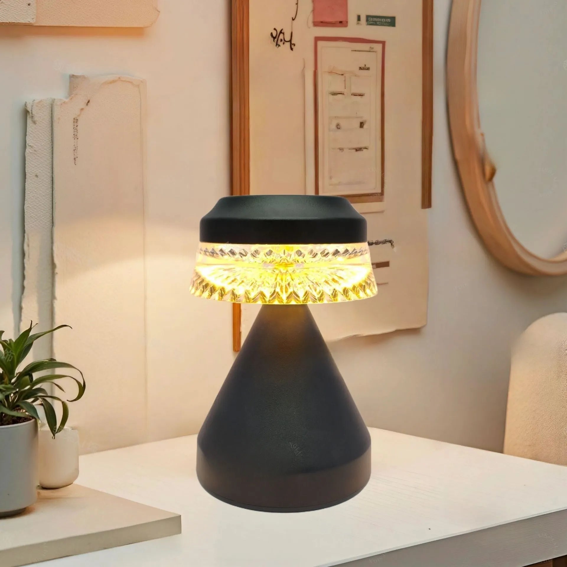 Small modern bedside LED lamp in orange with USB charging cable, showing dimmable light feature.