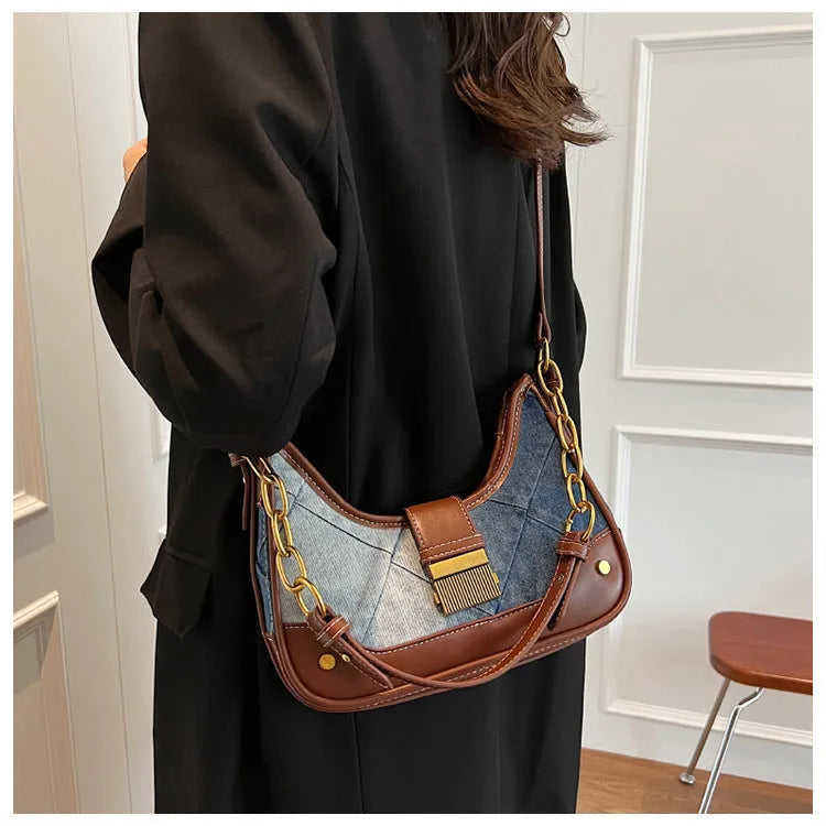 Brown denim women's bucket shoulder bag with diamond mesh patterns and chain details