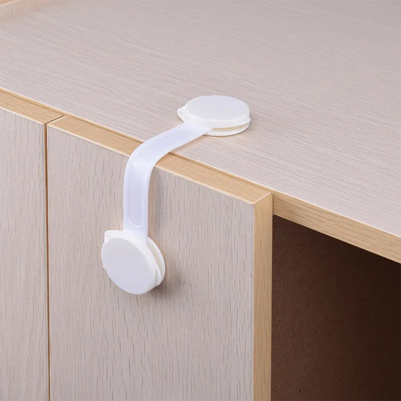 Transparent child safety lock anti-clamp hand design for cabinet drawer protection