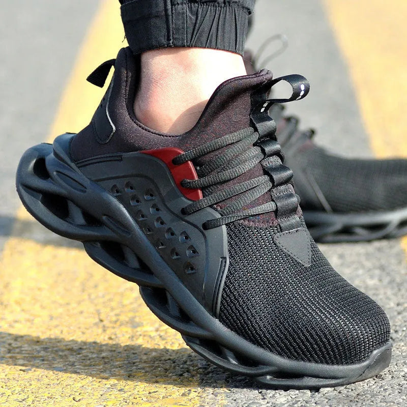 Men's anti-puncture safety sneakers with steel toe, lace up, black, breathable fly woven upper and EVA sole
