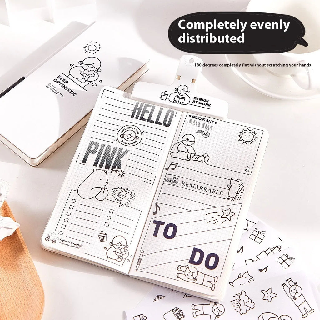 Children's paper notebook with mesh cover and plaid pages, showing sticker accessories