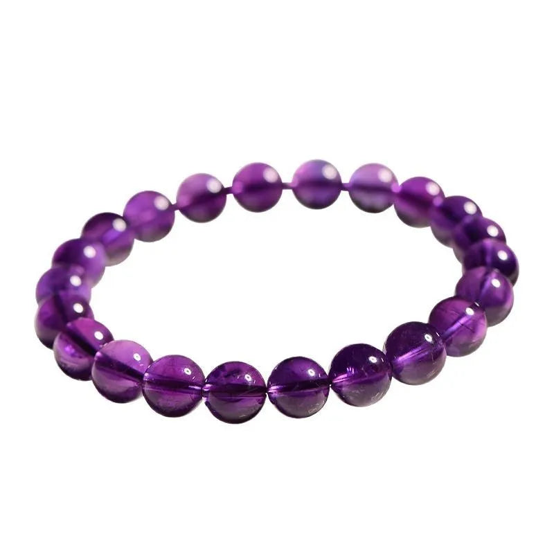 Natural amethyst Uruguay bracelet with scattered polished beads on a single ring.