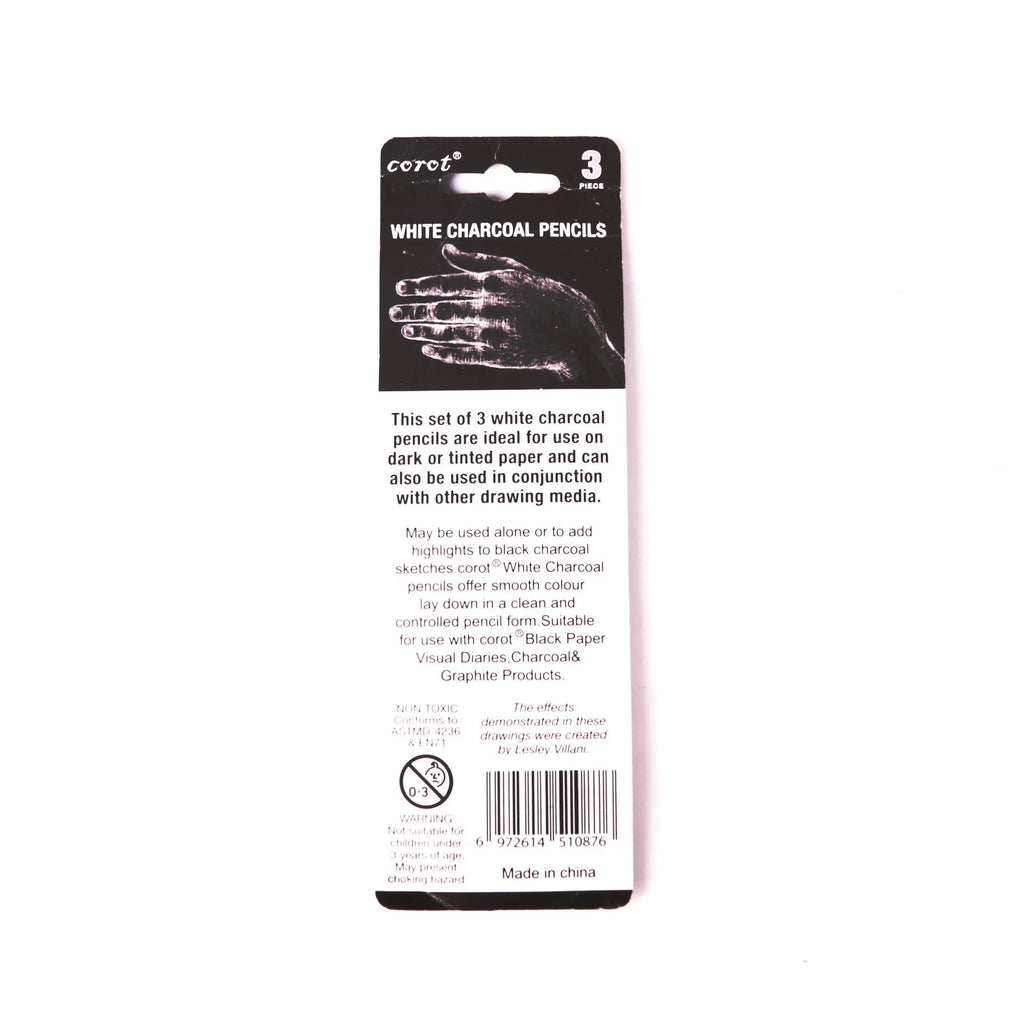Three white charcoal pencils in wooden casings for art sketching on dark paper
