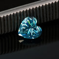 Heart-shaped loose moissanite gemstone in lemon yellow colour showing precise cut and dimensions