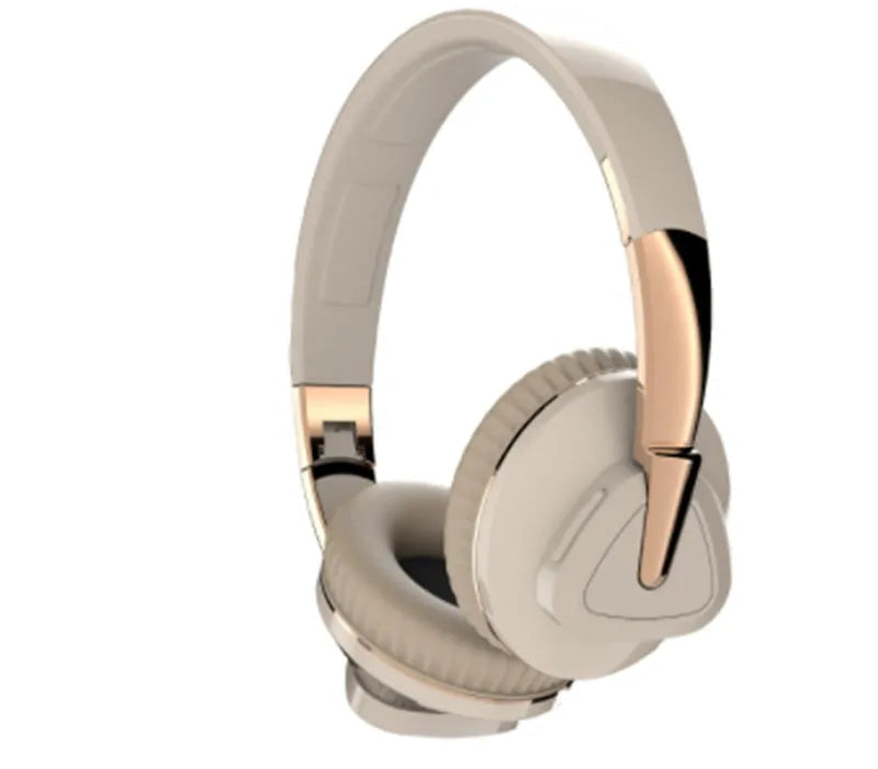 Wireless over-ear headset in black with soft ear cushions, showing AUX audio jack port.