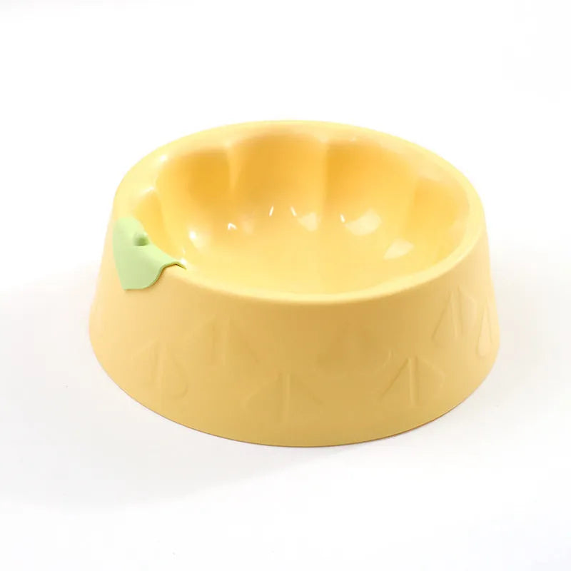 Green plastic double pet bowl with flower-shaped feeding areas and anti-tipping base design
