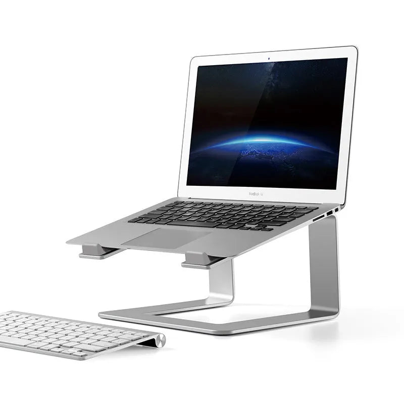 Black aluminium alloy foldable laptop stand with adjustable tilt on desktop
