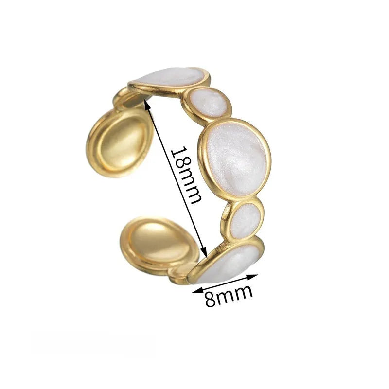 Stainless steel geometric ring with adjustable opening and electroplated metallic finish