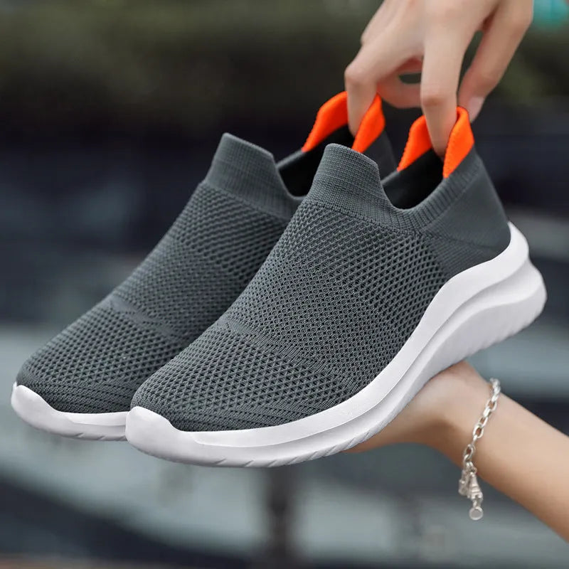 Men's breathable mesh running shoes with round toe and lightweight MD sole in multiple colour options