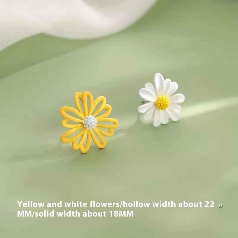 A pair of alloy cartoon flower stud earrings in blue and orange two-tone colours.