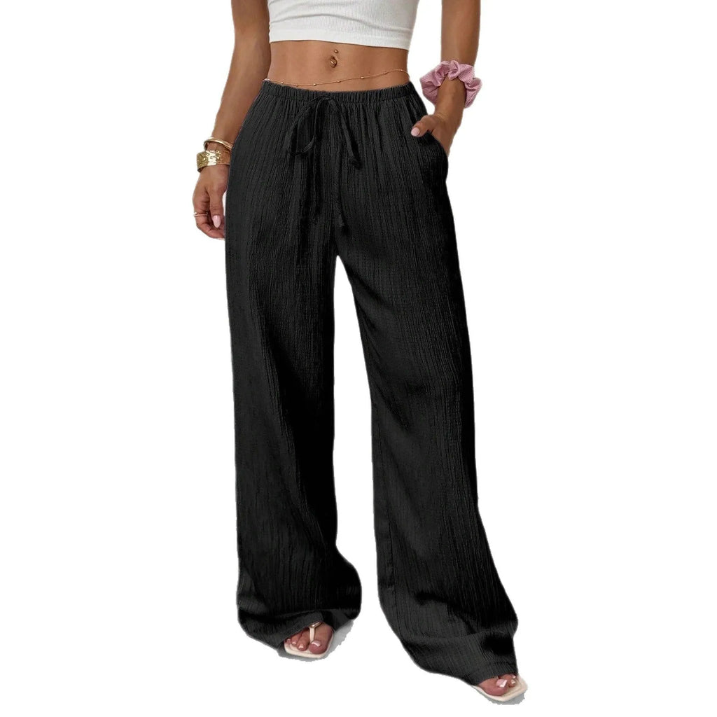 Women's wide leg trousers with lace-up waist trimming detail in polyester fabric