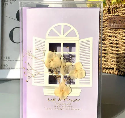 Handmade 3D boxed greeting card with butterfly shape, hot stamping, and artificial flowers on coated paper.