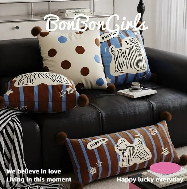 Blue cartoon animal printed cushion on a grey sofa, showing removable cotton canvas cover and 45x45cm size.