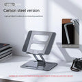 Folding aluminium alloy laptop and tablet stand in silver on a desk, showing unfolded position