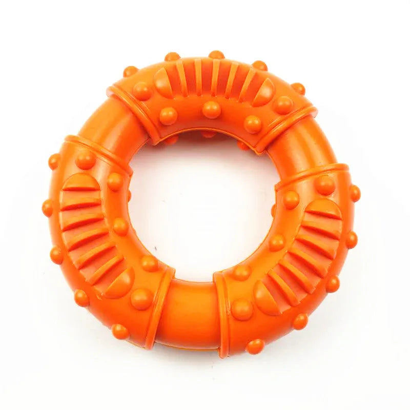 Blue hollow dog fetch stick toy on grass, showing its lightweight chewy construction for safe fetching games