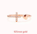 S925 sterling silver love cross women's open ring in white gold and rose gold on white background