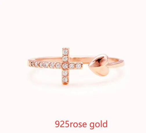 S925 sterling silver love cross women's open ring in white gold and rose gold on white background
