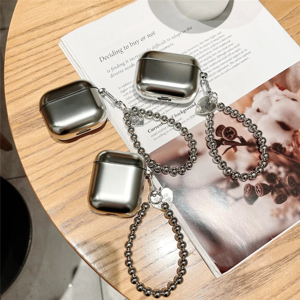 Matte plating protective case for AirPods with integrated bracelet showing electroplated finish