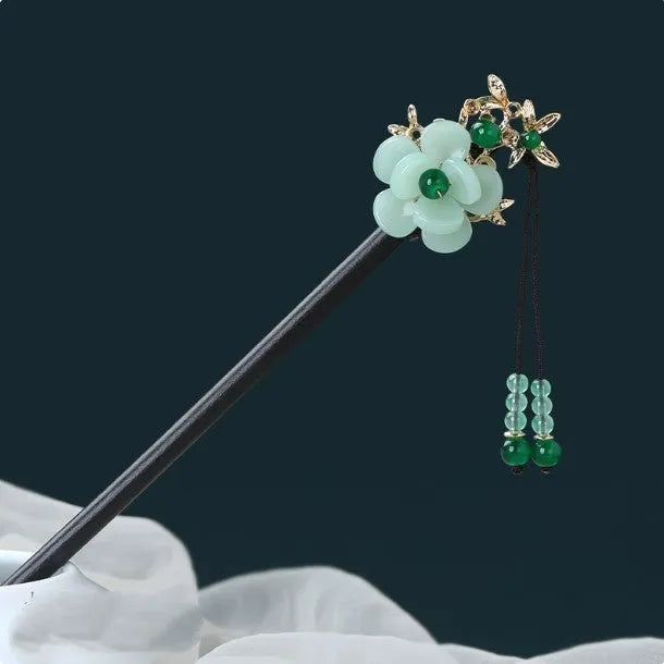 Chinese ancient style floral alloy hairpin with electroplated finish on dark background