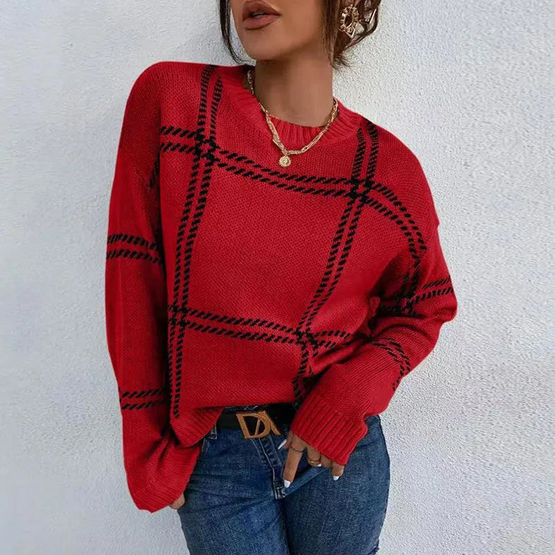 Women's loose fit plaid sweater with colour-block stripes in apricot, black, beige, red, and green.