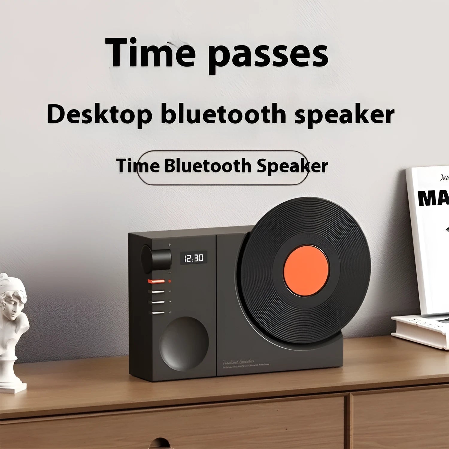 Mini portable Bluetooth speaker in Obsidian Black colour with a card slot, shown with USB cable.
