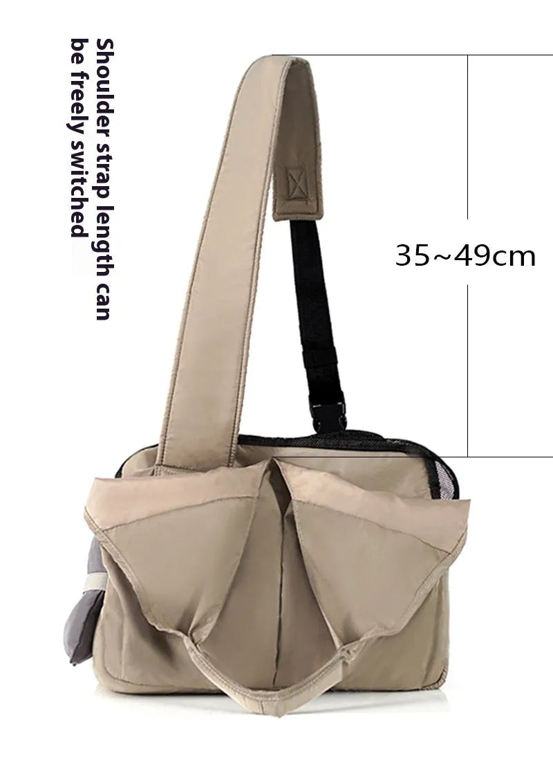 Apricot-coloured cloth pet carrier handbag for outdoor use with small pets.
