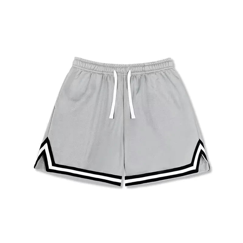 Men's loose polyester sports shorts in multiple colours on a size chart background.