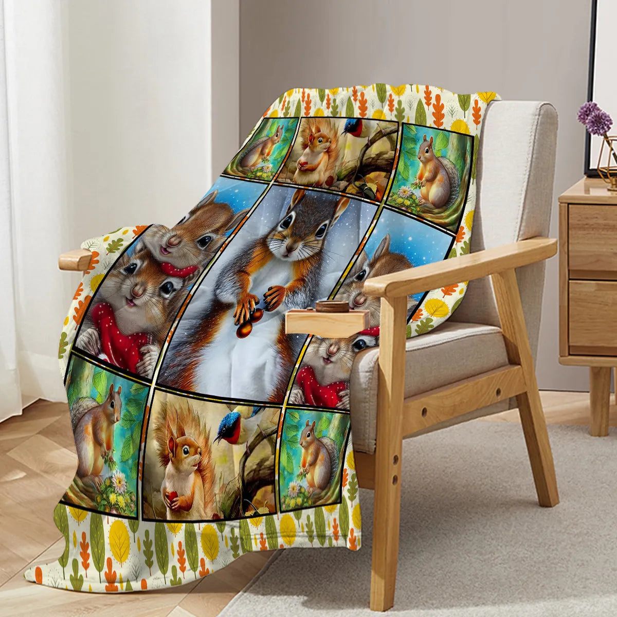 Yellow flannel blanket with white bellied squirrel print, 130x150cm, on a sofa