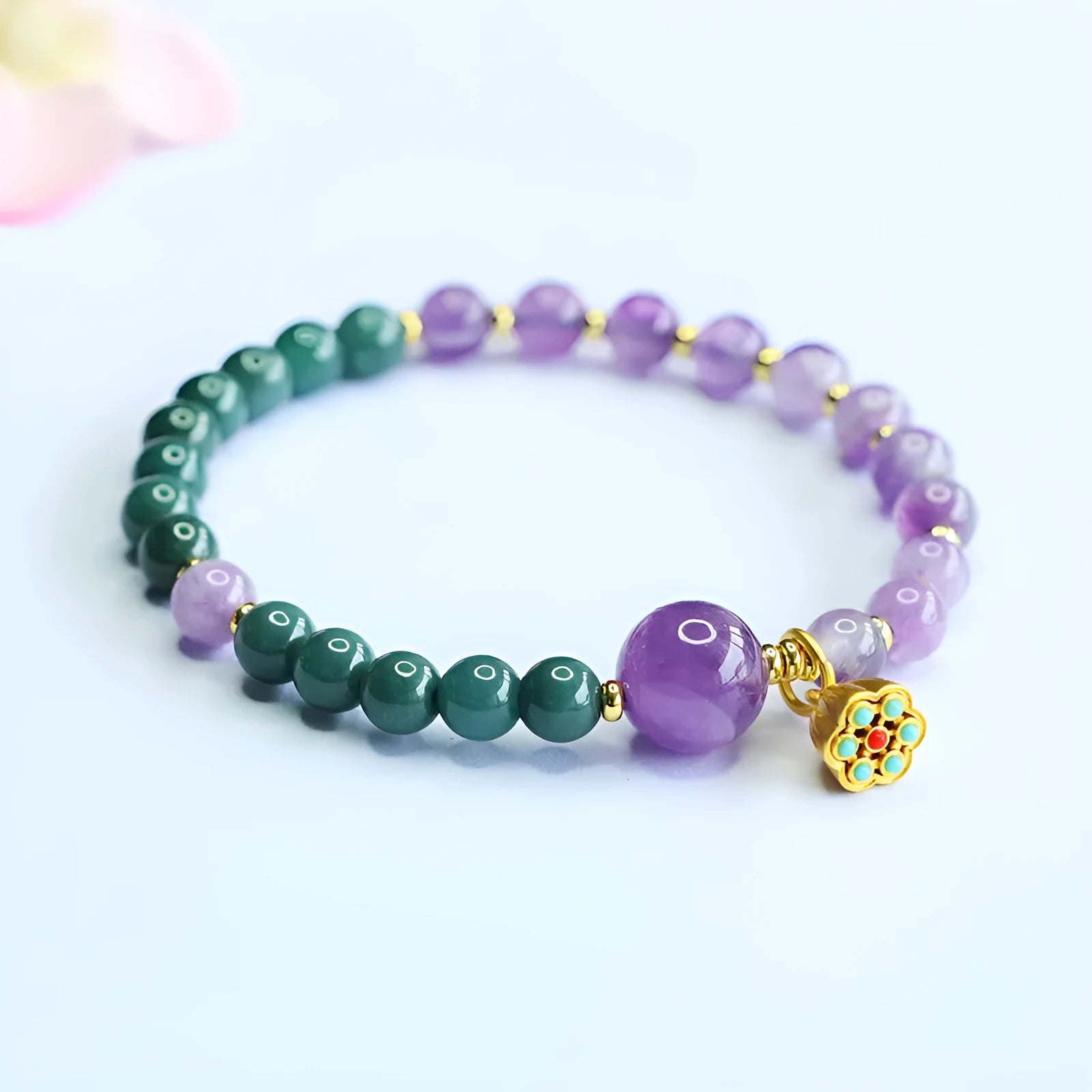 Natural blue water jade amethyst bracelet hand-woven with 6-10mm beads on white background