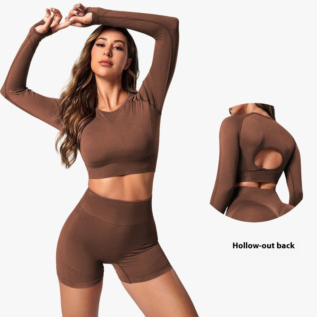 Women's black high waist yoga suit with long sleeves and matching pants