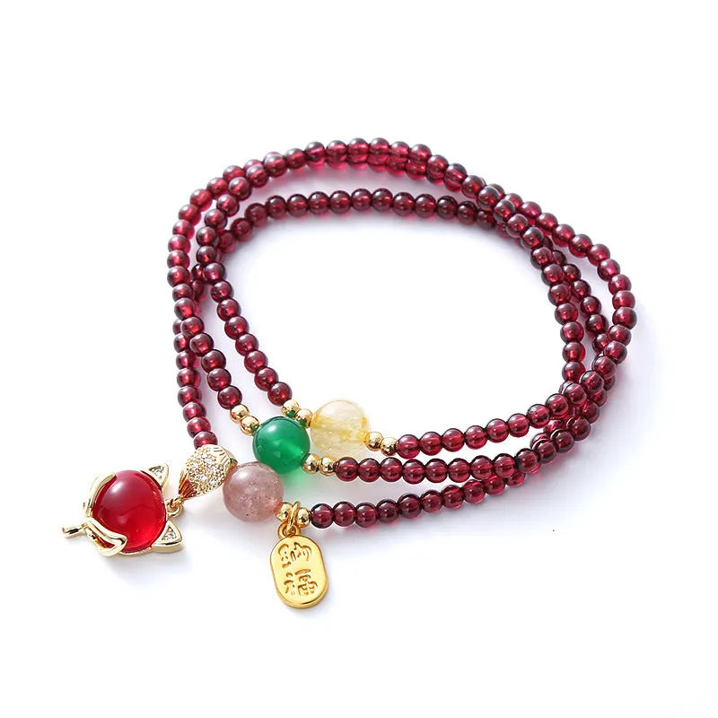 Purplish red garnet fox bracelet with adjustable rope tie for women