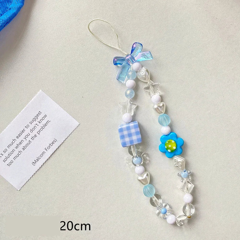 Colourful beaded flower mobile phone lanyard with hand rope design in blue, pink and yellow options