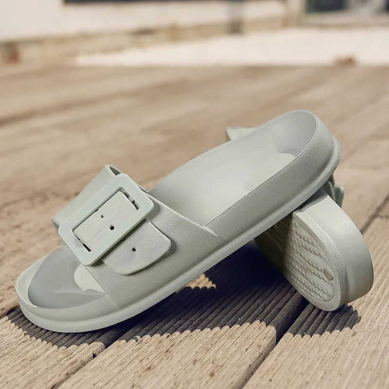 Women's grey blue flip-flop slippers with adjustable buckle strap and textured EVA sole