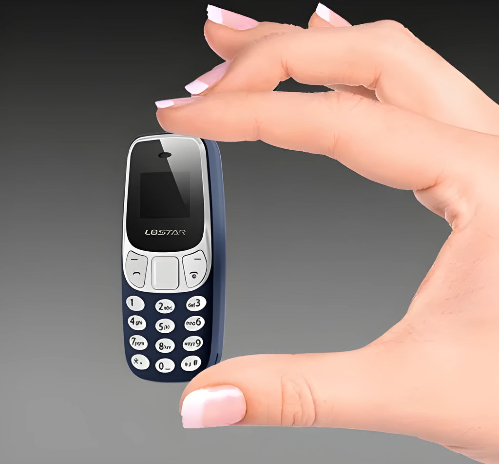 Ultra-small miniature thumb phone with 0.66-inch OLED display and keypad, smaller than a lighter