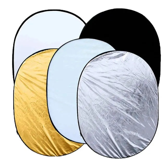 Collapsible 5-in-1 photography light reflector showing gold, silver, white, black and translucent surfaces