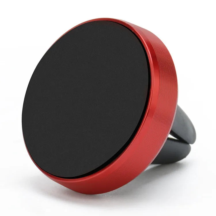 Magnetic car phone holder mounted on vehicle air vent in rose gold colour