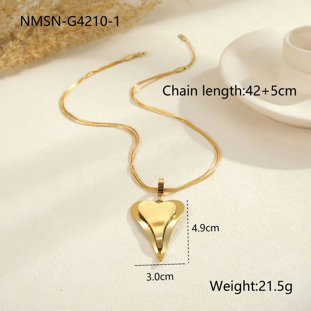 Women's stainless steel necklace with geometric double heart snake bones pendant in gold or steel finish