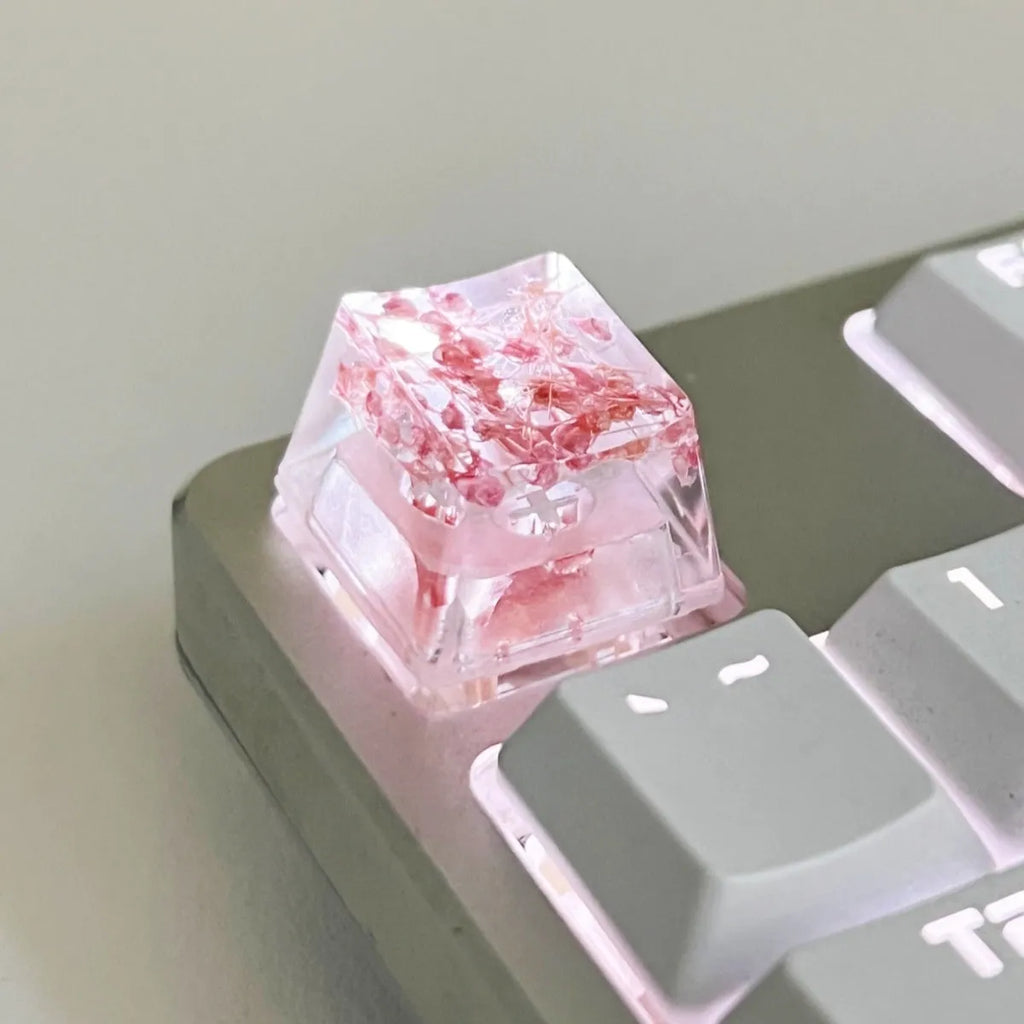 High transparency resin mechanical keyboard keycap with starry sky design in one of four colours.