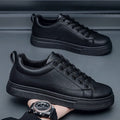 Men's low-top Korean-style casual sneaker in black with a white rubber sole and round toe.