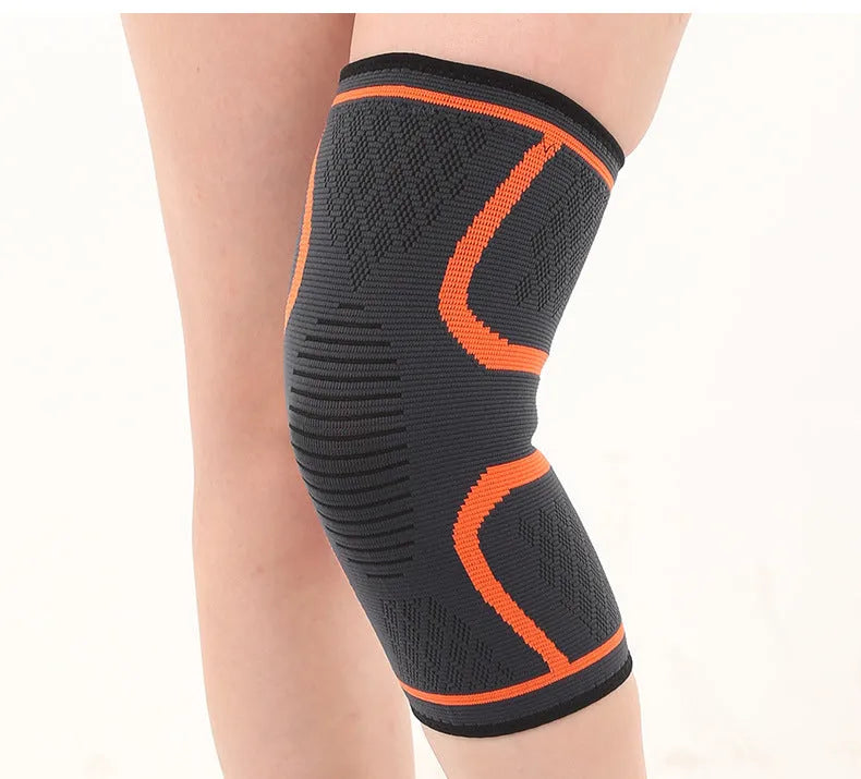 Double corrugated non-slip stretch sports knee pads in assorted colours on a grey background.